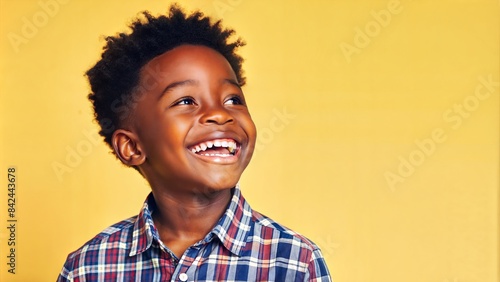 Portrait of a joyful boy. © hobonski
