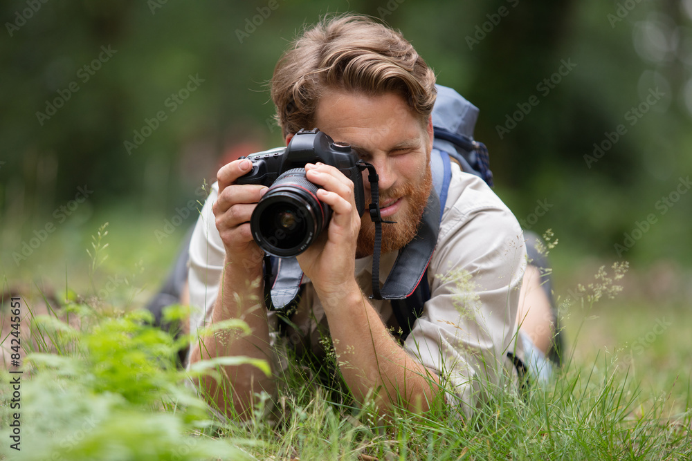 Fototapeta premium closeup portrait of a young man taking a picture