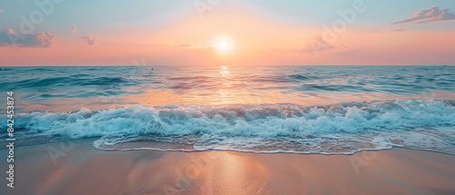 Serene Sunset Scene at Summer Beach with Calm Waves and Clear Sky