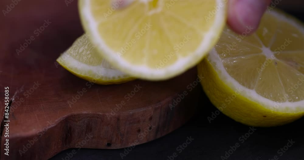 slices of fresh lemon for making lemon juice, close-up of a table with slices of yellow lemon slices of fresh lemon for making lemon juice, close-up of a table with slices of yellow lemon