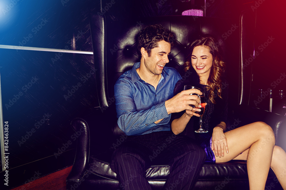 Happy couple, cheers or smile in nightclub with cocktails, drinks or champagne for vip event, memory or date. People, man or excited woman in dark disco party couch for alcohol, toast or celebration Happy couple, cheers or smile in nightclub with cocktails, drinks or champagne for vip event, memory or date. People, man or excited woman in dark disco party couch for alcohol, toast or celebration