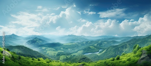 Panoramic view of mountain range with forest  under blue sky  for World Environment Day concept  including copy space image.