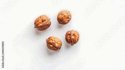 Isolated candlenuts on a white background. photo