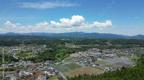 Drone view of rural Japanese landscape on clear summer day
