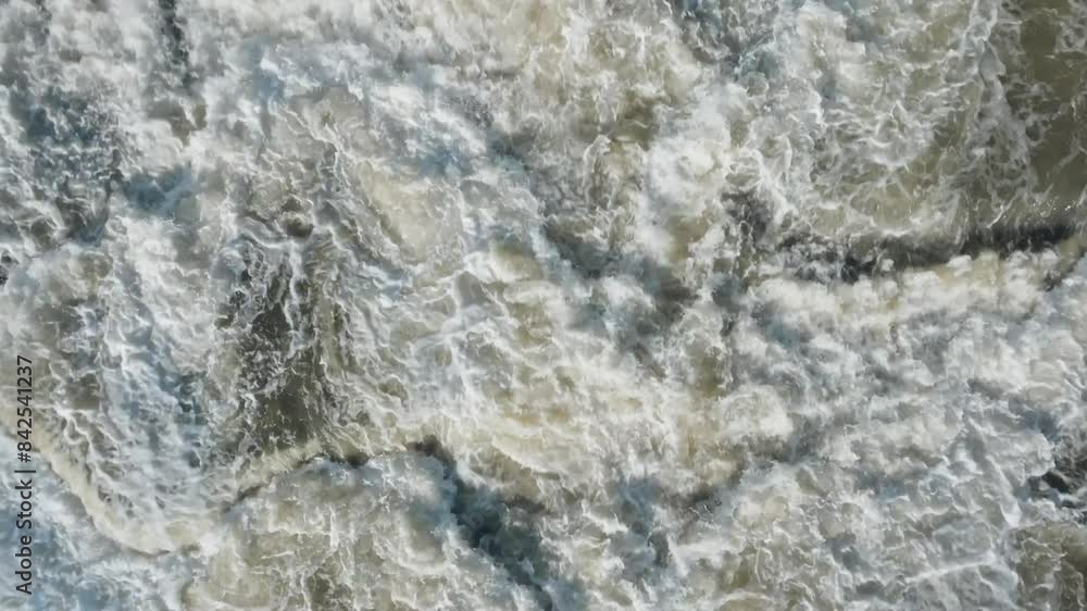 Cascading waterfall in owen sound, canada with turbulent white water flow, aerial view Cascading waterfall in owen sound, canada with turbulent white water flow, aerial view