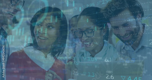 Wallpaper Mural Image of multiple graphs and trading board over diverse coworkers discussing reports on laptop Torontodigital.ca