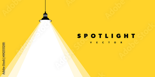 Spotlight shining. Illuminated light yellow background