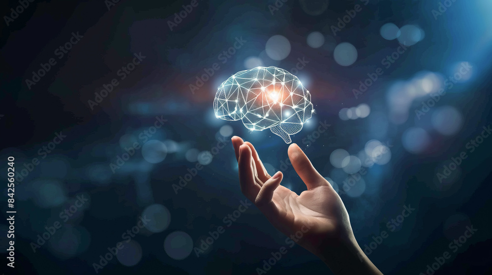 A hand holding a brain with a red light on it. Concept of intelligence and the importance of the brain A hand holding a brain with a red light on it. Concept of intelligence and the importance of the brain