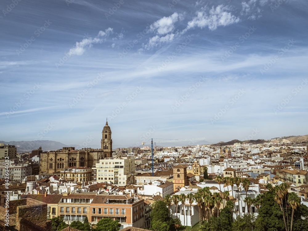 Obraz premium View of the Cathedral of Malaga with the city skyline as seen from the Alcazaba fortress
