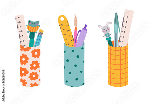 Cute cartoon set of pencil cups with checkered, flower and dot pattern with school supplies. Stationery container with pencil, pens, rulers. Holder case for office stationary. Back to school clipart