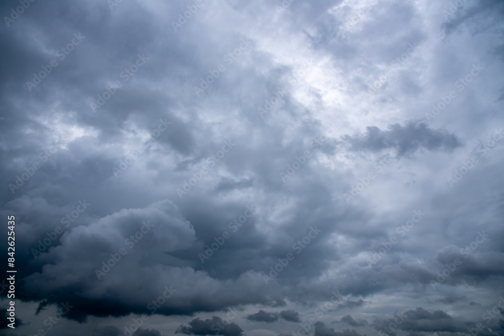 Dark sky with stormy clouds. Dramatic sky rain,Dark clouds before a thunder-storm. Dark sky with stormy clouds. Dramatic sky rain,Dark clouds before a thunder-storm.