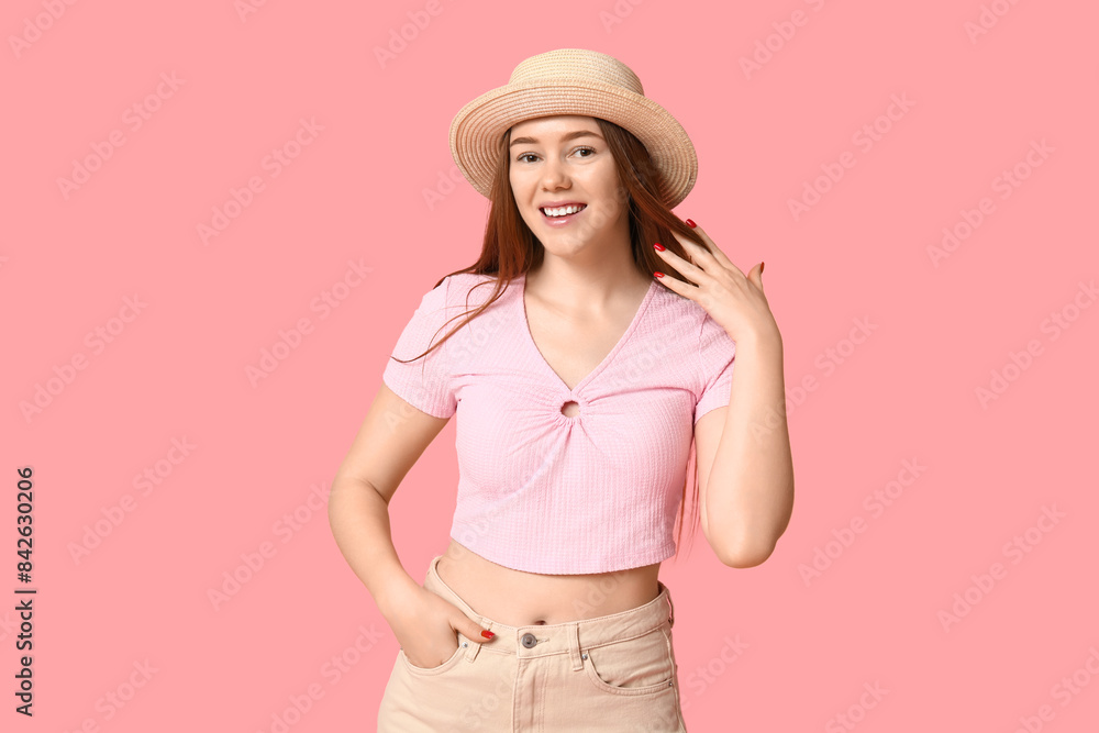 Stylish young girl in hat on pink background Stylish young girl in hat on pink background
