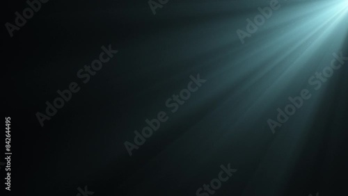 Beautiful Volume Light in the Dark Seamless. Blue Rays Moving on Black Background with Floating Dust Particles Looped 3d Animation. Underwater Sun Beams Shining Deep 4k. photo