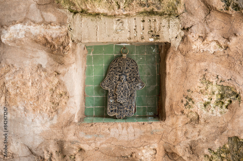 Hand of Fatima or Hamsa (Khamsa) amulet or Miriams Hand (Miriam's Hand). Amulet popular throughout the Middle East and North Africa and commonly used in jewelry and wall hangings. photo