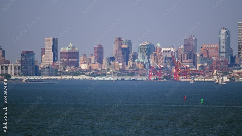 Panoramic view of a cityscape with waterfront, skyscrapers, modern architecture Panoramic view of a cityscape with waterfront, skyscrapers, modern architecture