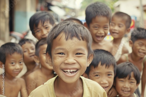 Group of asian children smiling and looking at the camera with happiness