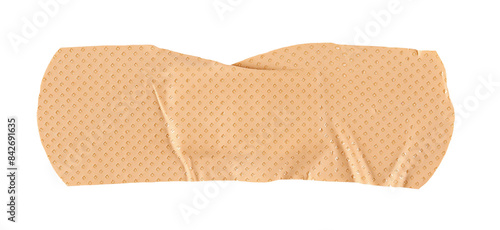 Schilderij op canvas Adhesive band aid crumpled isolated on white background, top view