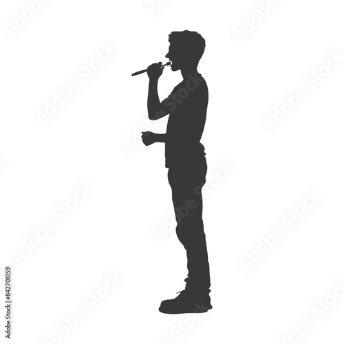 Silhouette of a Young Male Singer with Microphone, Profile View