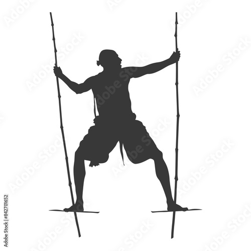 Silhouette of a Man on Bamboo Stilts, Traditional Walker.