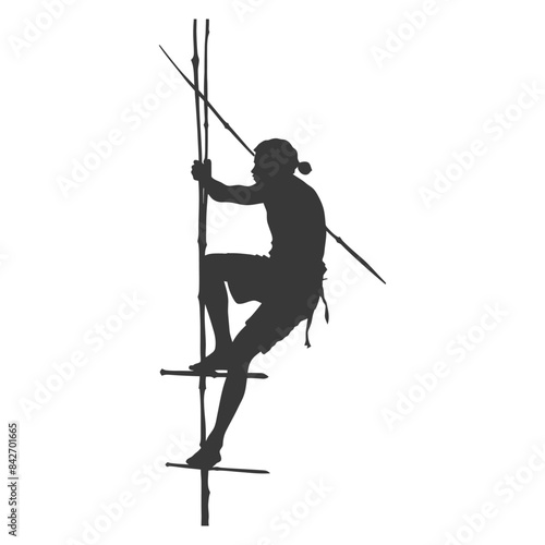 Silhouette of climber ascending bamboo ladder, fishing spear slung.
