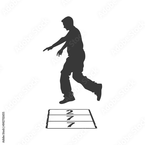 Agility Training: Silhouette of Man Jumping Over Hopscotch Ladder Drill.