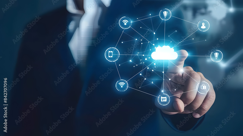 Businessman touching a cloud technology icon with a network connection on a virtual screen. Business man using an online web banner Businessman touching a cloud technology icon with a network connection on a virtual screen. Business man using an online web banner