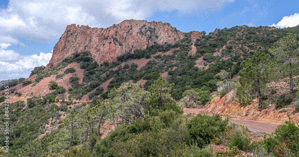 Massif de l'Esterel, a volcanic mountain range on the Mediterranean Sea coast on the French Riviera, located near Cannes on the east and Saint-Rafael on the west, France Massif de l'Esterel, a volcanic mountain range on the Mediterranean Sea coast on the French Riviera, located near Cannes on the east and Saint-Rafael on the west, France