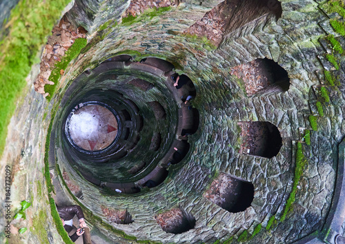 View of the well of initiation in the territory of Quinta da Regaleira, near the city of Sintra, Portugal. photo