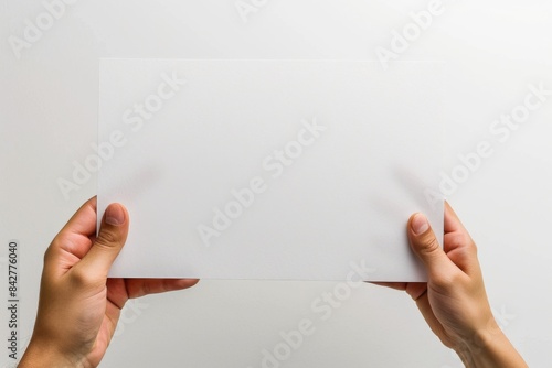 Wallpaper Mural Blank paper mockup on hand created with generative AI Torontodigital.ca