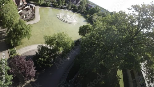 Experience the captivating beauty of Copenhagens Tivoli Gardens like never before with our breathtaking aerial footage. Marvel at the mesmerizing patterns created by the dancing fountains, set against