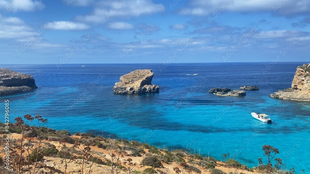 Comino Island Malta, Boat rides and visits to Comino Caves. Blue mediterranean sea. High quality photo Comino Island Malta, Boat rides and visits to Comino Caves. Blue mediterranean sea. High quality photo