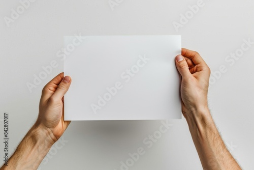 Wallpaper Mural Blank paper mockup on hand created with generative AI Torontodigital.ca