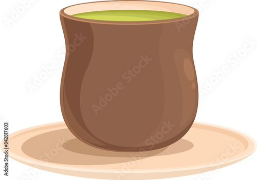 Brown earthenware tea cup full of green matcha tea is resting on a matching saucer