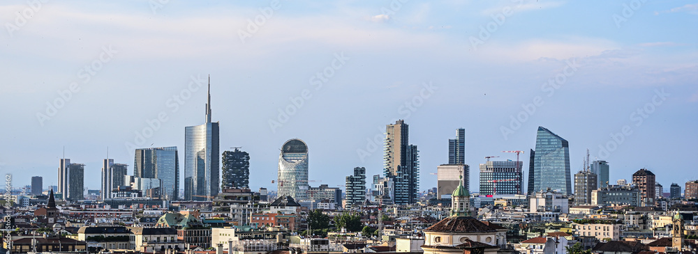 Fototapeta premium Milan, new panoramic skyline 2024. The picture was taken from the Duomo cathedral and shows the new buildings and skyscrapers of the Garibaldi district.