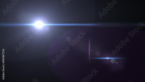 Intense light shining and moving in a continuous loop. Blue, white and violet colors. Iris and bokeh effects. Vfx. 4k. Ideal for composition. Isolated. Abstract and scifi concepts. photo