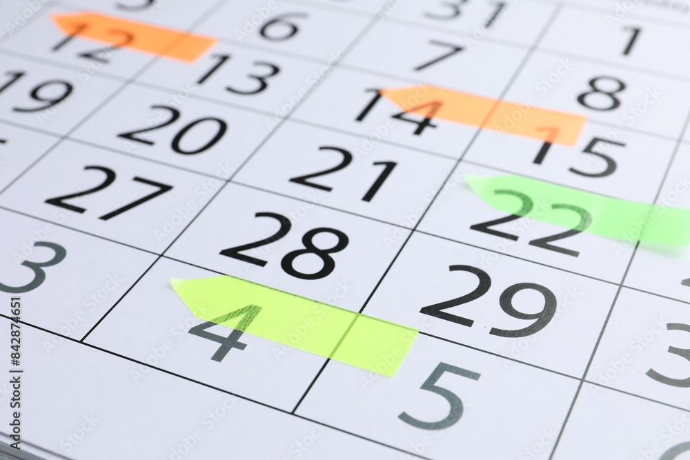 Timetable. Calendar page with colorful sticky notes, closeup Timetable. Calendar page with colorful sticky notes, closeup