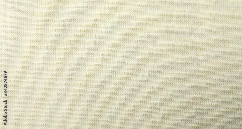 Fototapeta premium Texture of beige fabric as background, top view