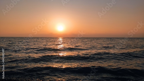 Amazing photo of sunset over the beautiful sea 