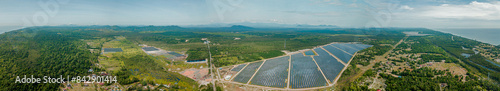 Panorama view of solar panels farm scenery at Pantai Jambu Bongkok, Marang, Terengganu, Malaysia. photo