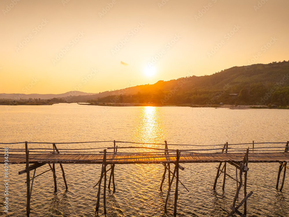 Obraz premium View of Ong Cop bridge or Tiger wooden bridge, Vietnam's longest wooden bridge in Chi Thanh district, Phu Yen province, Vietnam