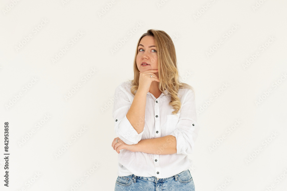 Closeup photo of amazing lady looking up empty space deep thinking creative person arm on chin wear white shirt isolated white color background Closeup photo of amazing lady looking up empty space deep thinking creative person arm on chin wear white shirt isolated white color background