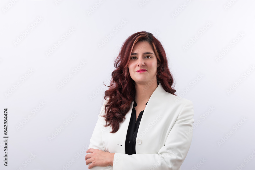 Young business woman smiling to camera happy standing with crossed arms isolated on light background and copy space. Concept of business, success and woman Young business woman smiling to camera happy standing with crossed arms isolated on light background and copy space. Concept of business, success and woman