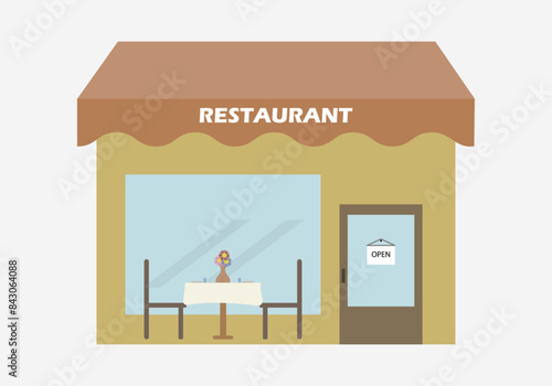 Local de un restaurante con silla y mesa exterior.