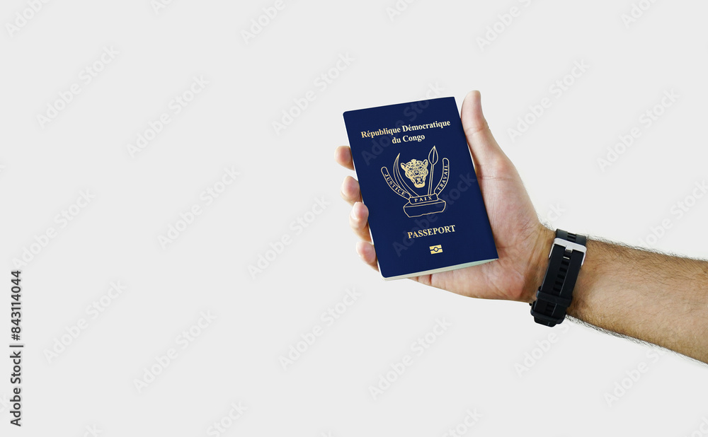 Man holding Congo Passport in hand on white background with copy space - Democratic Republic of the Congo Man holding Congo Passport in hand on white background with copy space - Democratic Republic of the Congo