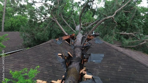 Homes with severe damage to their roofs after a tornado moved through the Houston area on May 16, 2024.