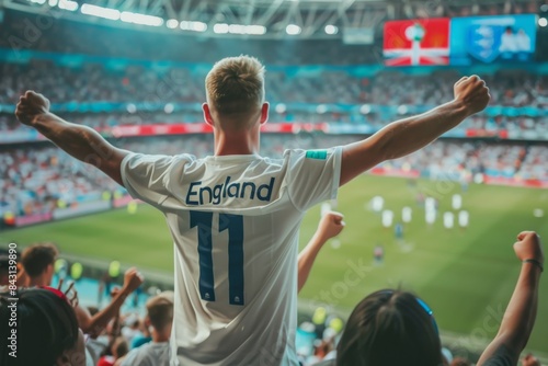 Happy fan screaming supporting England team at soccer.	 photo