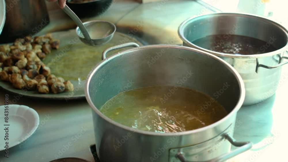 cooking food, taking broth from the pot, fa01 cooking food, taking broth from the pot, fa01