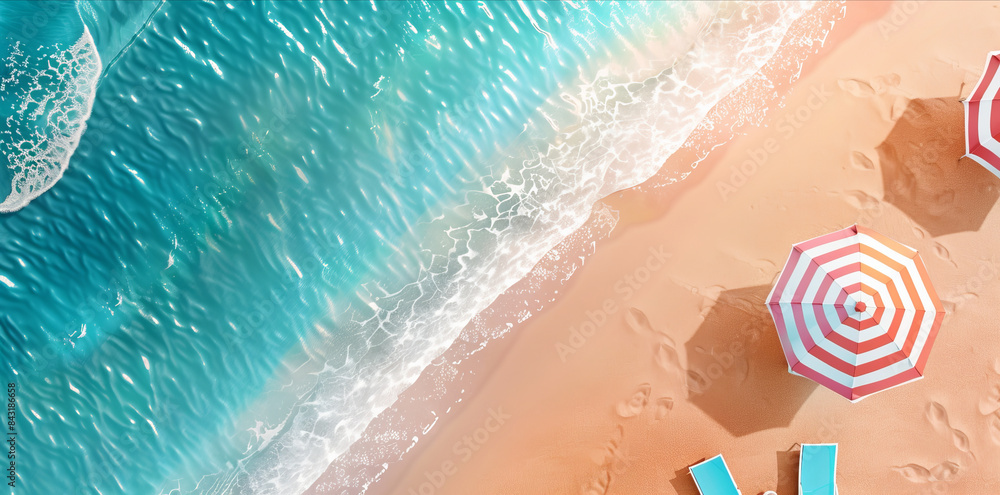 Obraz premium Overhead aerial view of sun umbrellas on a beautiful summer beach