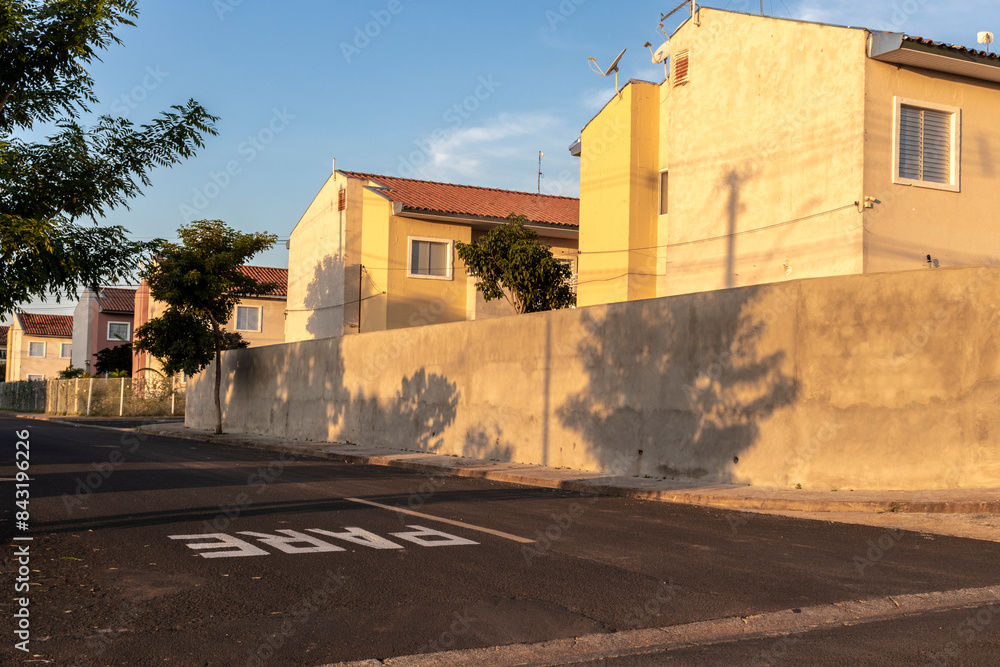 Residential street with houses, and written Residential street with houses, and written