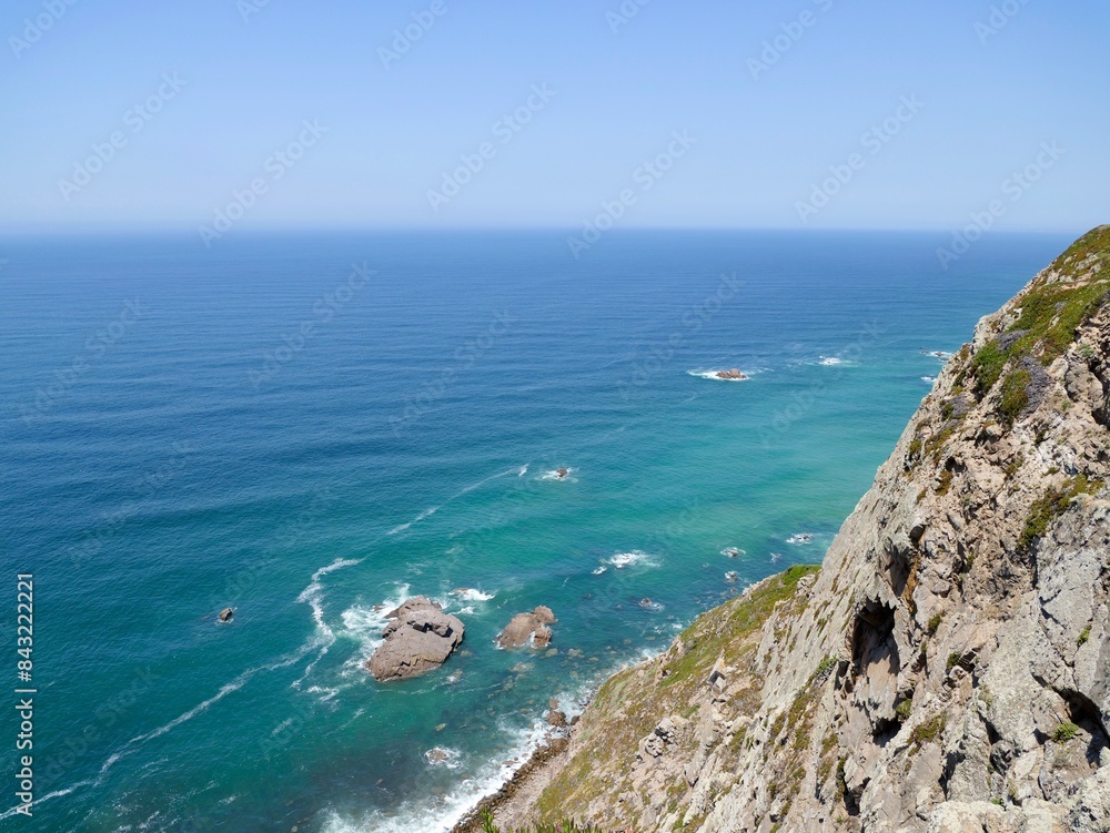 View of the coast from Cape Roca (Cabo da Roca), the westernmost point of the Sintra Mountain Range, of mainland Portugal, of continental Europe and of the Eurasian landmass View of the coast from Cape Roca (Cabo da Roca), the westernmost point of the Sintra Mountain Range, of mainland Portugal, of continental Europe and of the Eurasian landmass